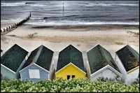 a row of beach huts